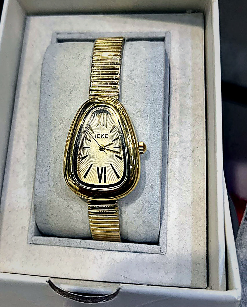 montre luxe pour femme dorée IEKE
