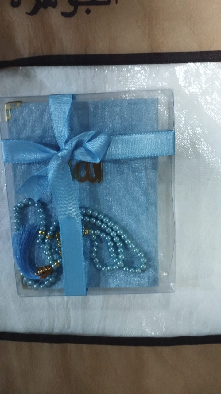 مصحف مع سبحة